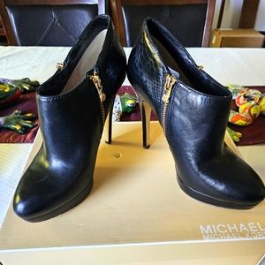 Micheal Kors booties.